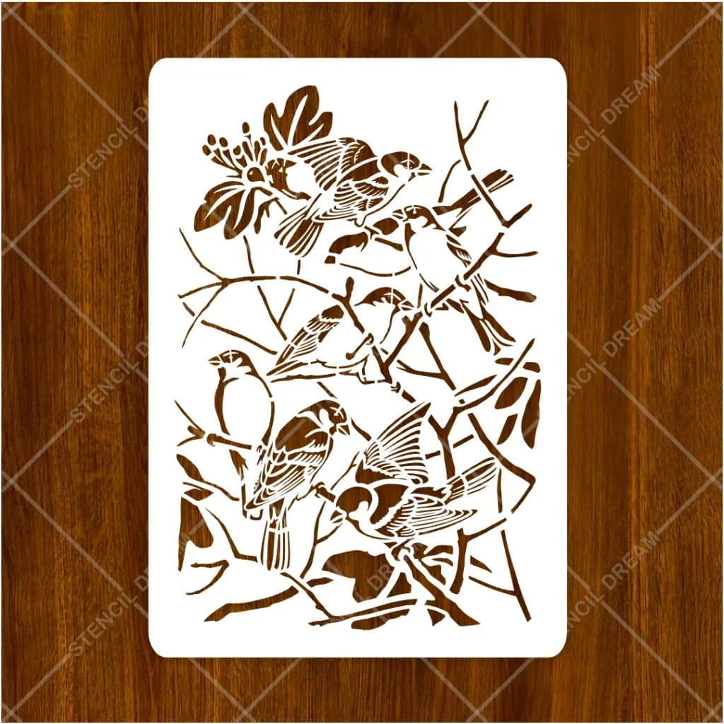 Close-up view of delicate feather and leaf cutouts on Nature Songbird Branch Flexible Stencil